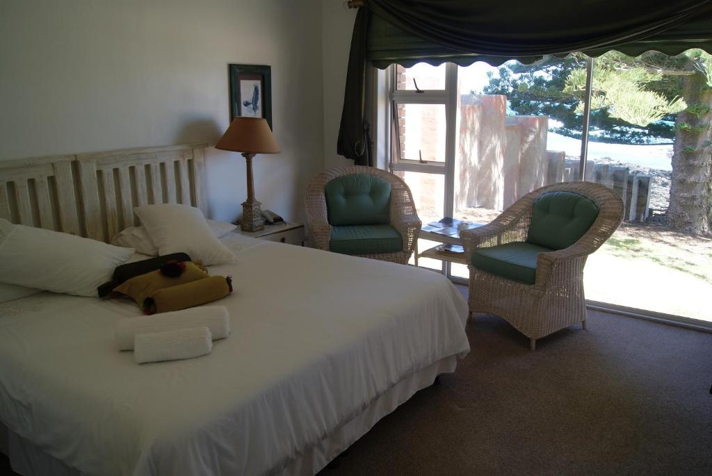 Sea Otters Lodge Kini Bay Quarto foto
